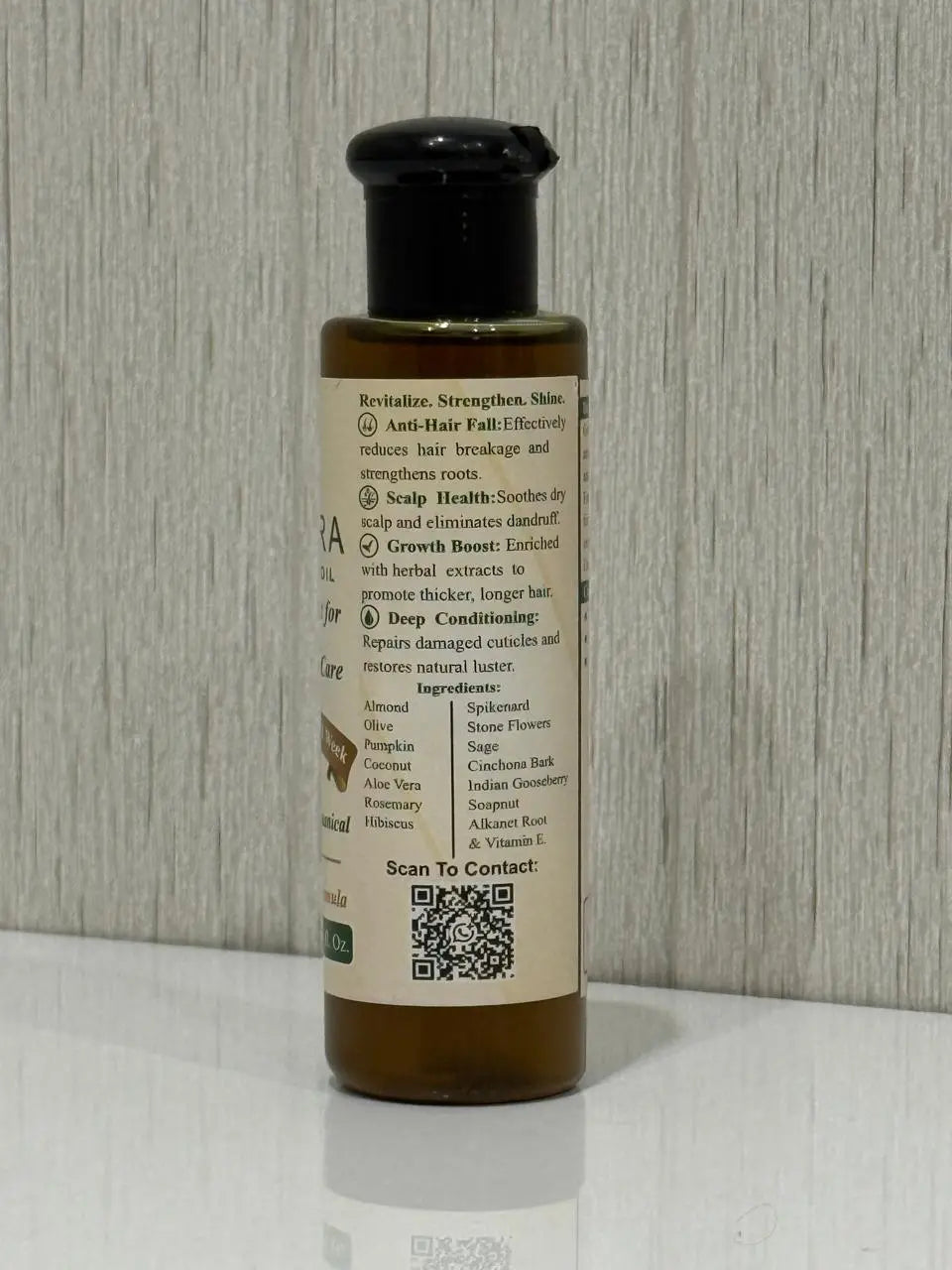 Zulfara Herbal Hair Oil packaging showing natural ingredients and usage benefits
